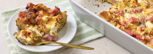 Plate with a slice of everything bagel breakfast casserole.