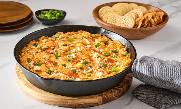 Buffalo chicken dip in a skillet