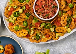 plate of pretzel chips with toppings