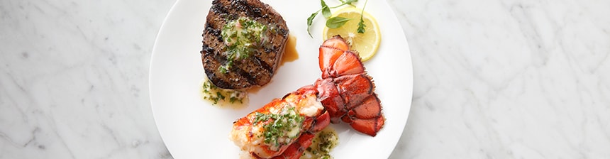 Grilled Filet Mignon and Lobster Tail with Herbed Butter Recipe