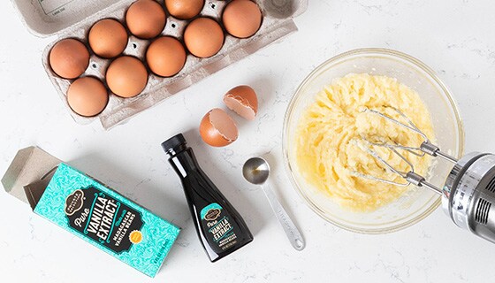 mixing eggs and vanilla extract