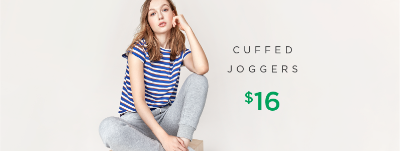 young woman in cuffed joggers