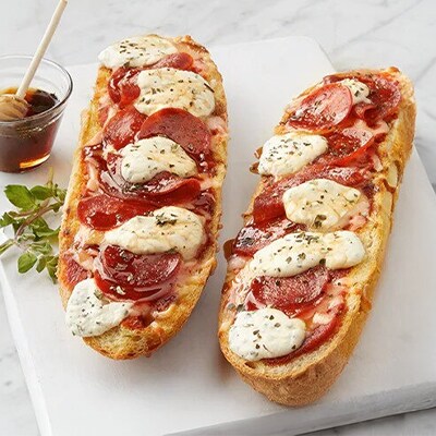 Making family night fun with freshly made pizzas at home.