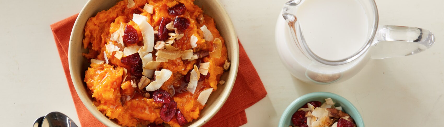 Sweet potato mash with raisins in a bowl Sweet potato mash with raisins in a bowl