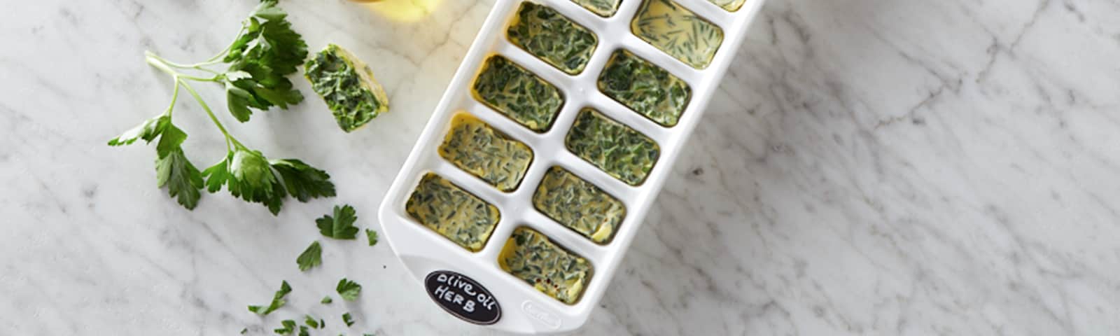Frozen leftover herbs in olive oil