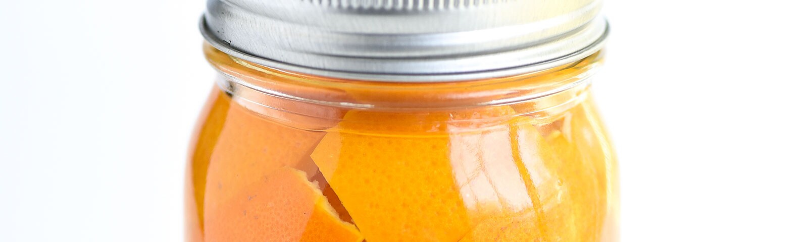A mason jar filled with orange peels