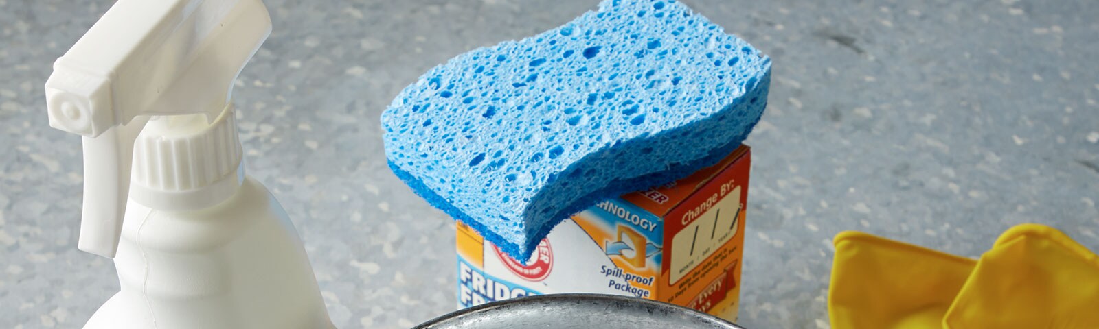 Cleaning supplies with blue sponge