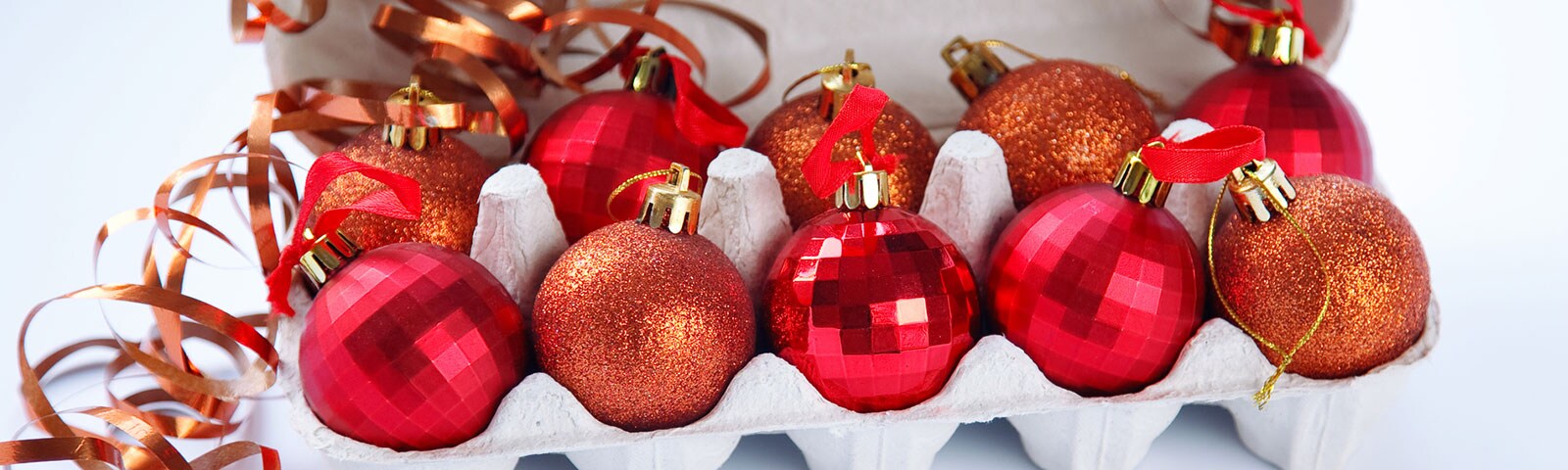 Storing holiday ornaments in an egg carton